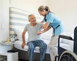 Hình ảnh về Nurse comforting an elderly patient